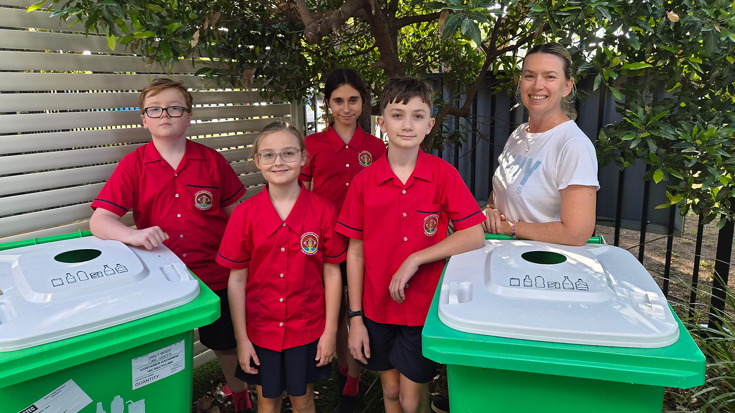 Students with recycling bins